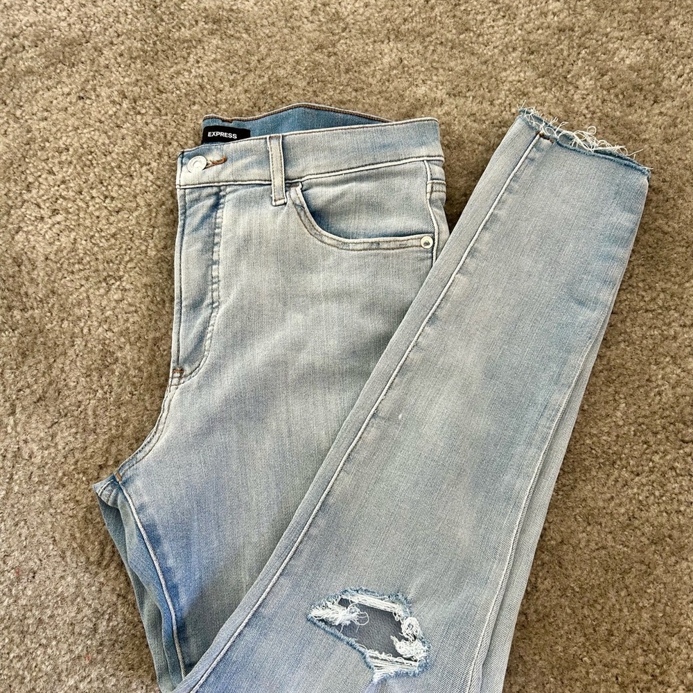 Express Light Blue Skinny Jeans with Distressed Detailing 💙